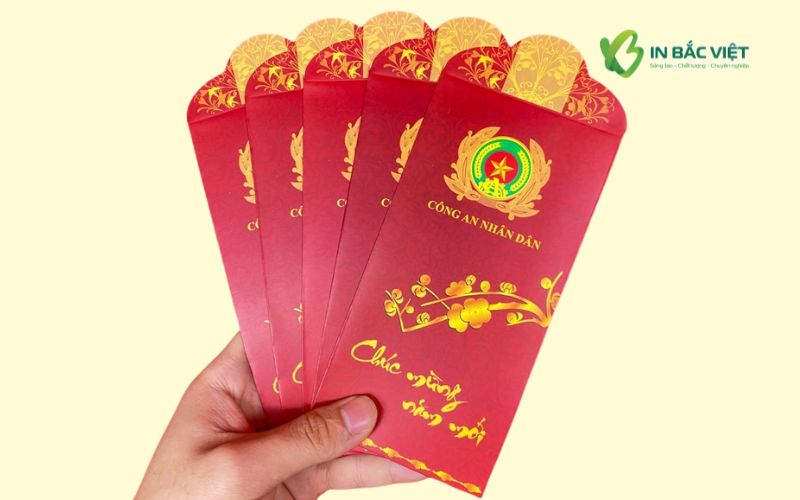 bao-li-xi-cand-in-logo-huy-hieu-noi-bat