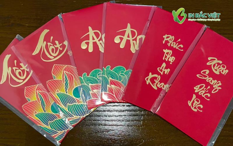 Bộ bao lì xì đỏ ép kim đẹp, họa tiết Tết nổi bật và chữ nhũ vàng sang trọng