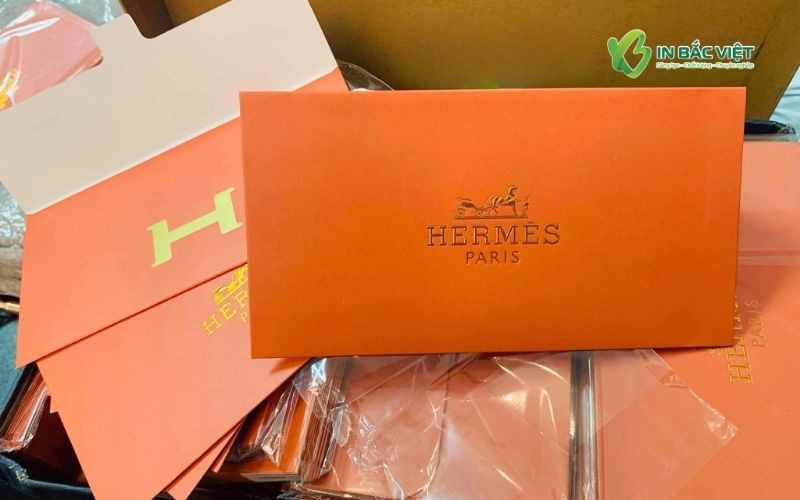 ep-kim-dap-noi-logo-in-bao-li-xi-thuong-hieu-cao-cap