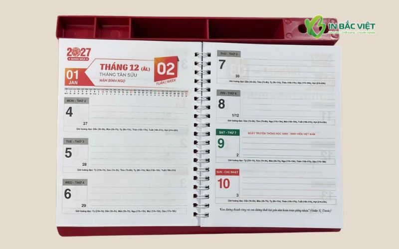 Alt: Ruột lịch bàn đế nhựa lò xo giữa hiển thị ngày tháng theo tuần